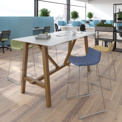 Café and bistro poseur stools with chrome sled frame, around a rectangular poseur dining table, with white top and wooden legs