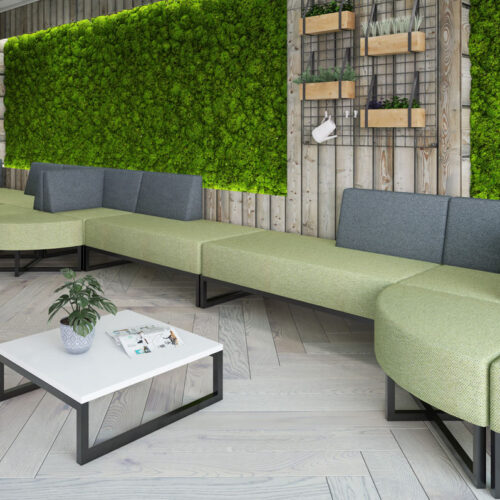 Configurable commercial sofas in green and grey fabric and a white sled frame coffee table