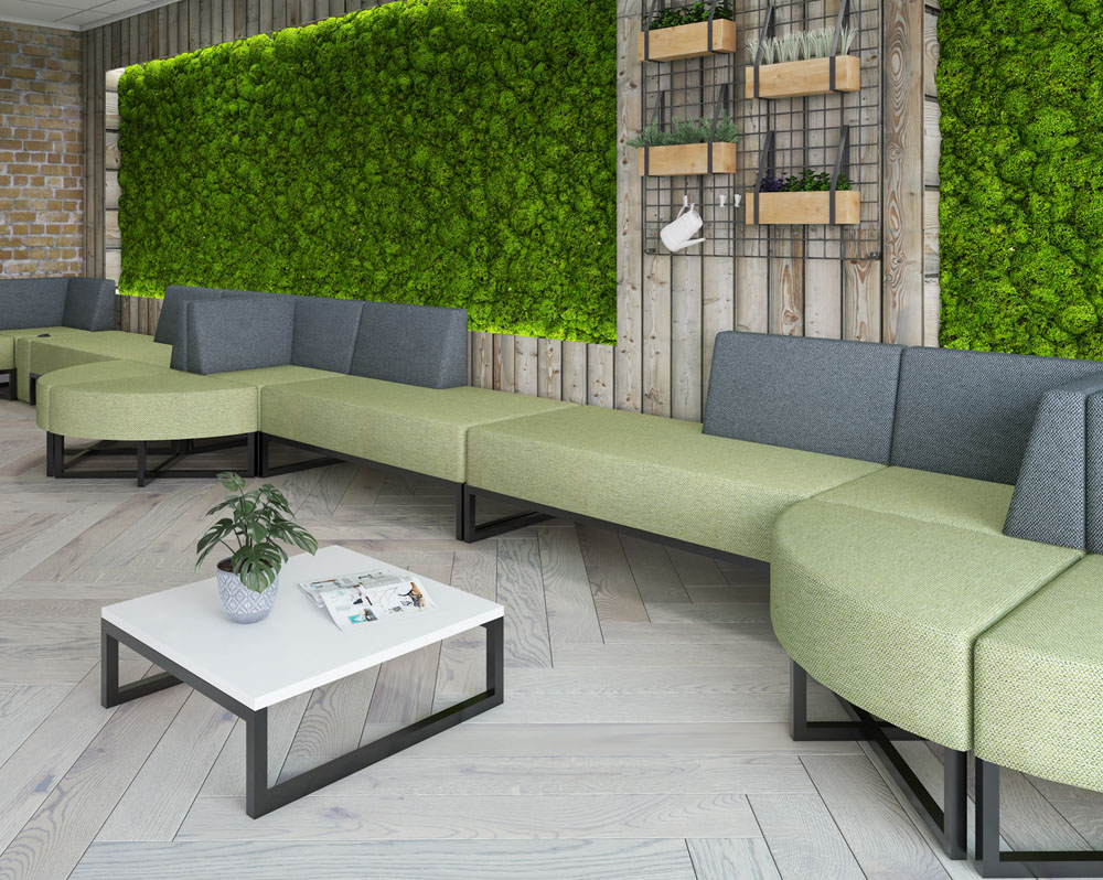 Configurable commercial sofas in green and grey fabric and a white sled frame coffee table