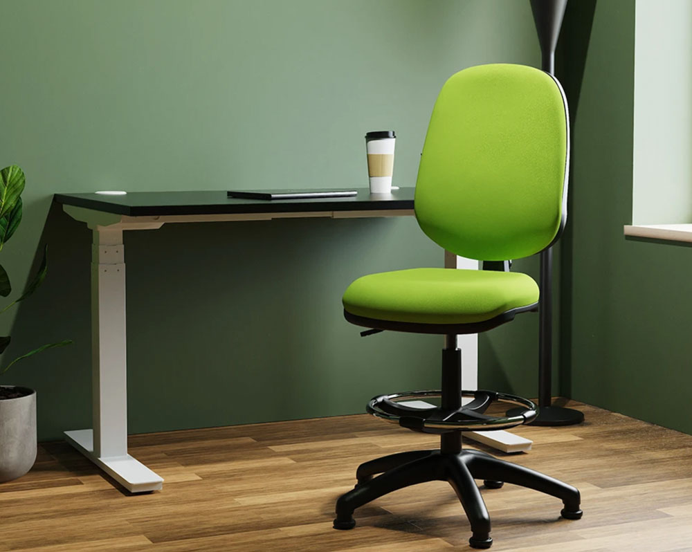 Draughtsman chairs in green fabric and no arms, at a height adjustable desk.