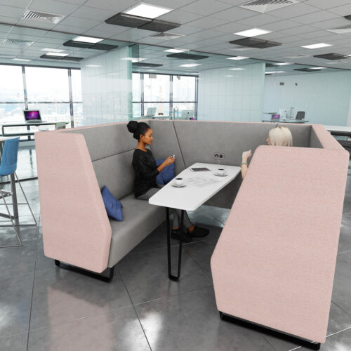 Enclosed side meeting booth in pink and grey fabric, and white table