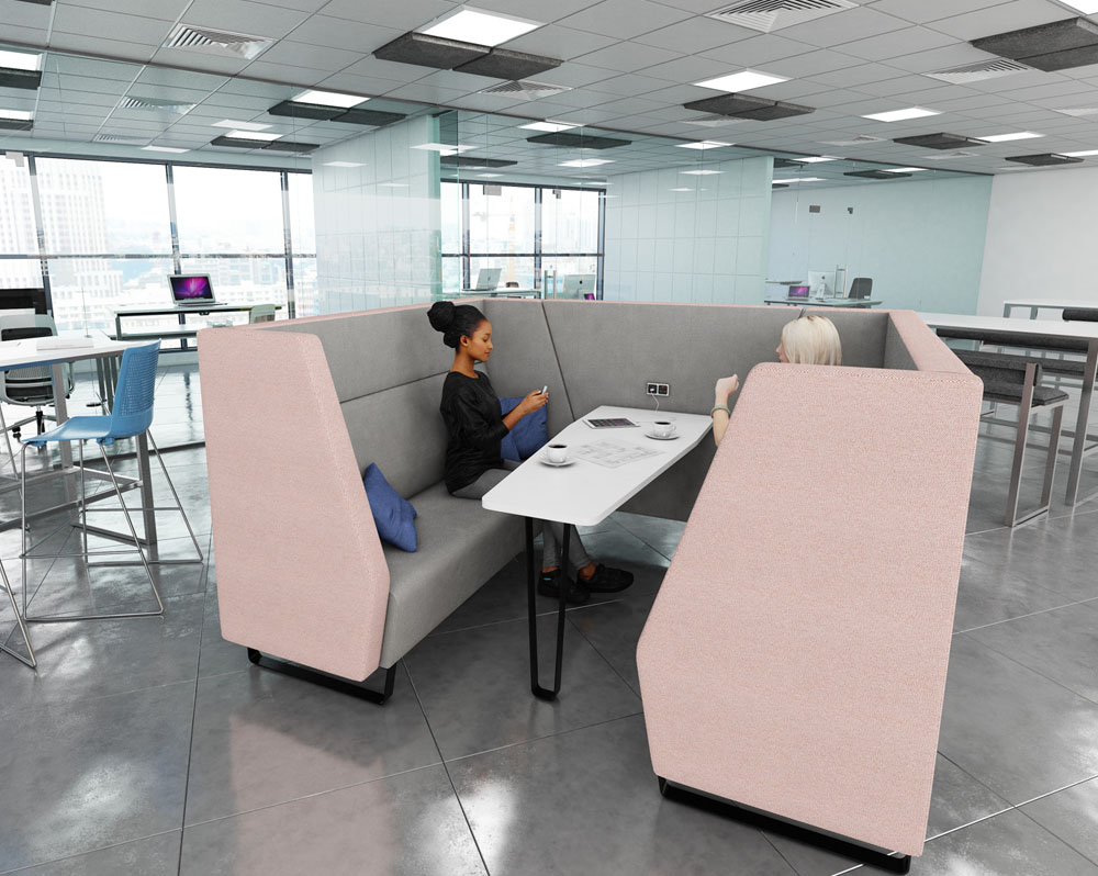 Enclosed side meeting booth in pink and grey fabric, and white table