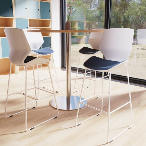 Ergonomic poseur stools, with white plastic shell, and a circular poseur table