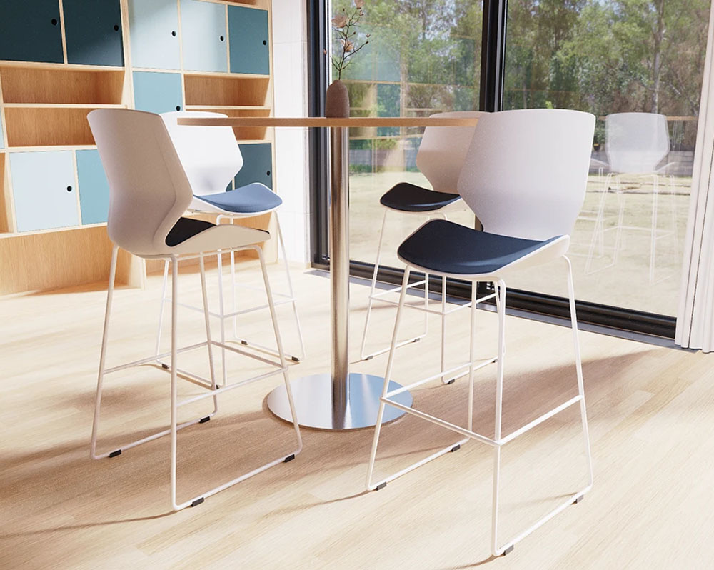 Ergonomic poseur stools, with white plastic shell, and a circular poseur table