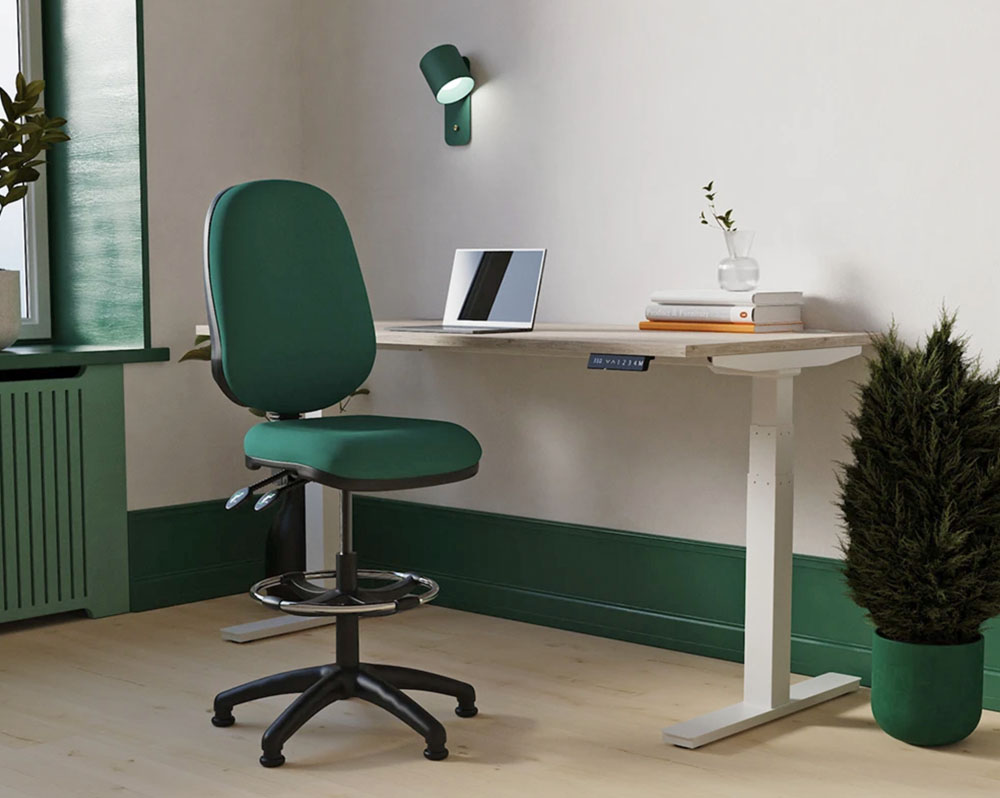 Fabric draughtsman chair in green fabric, at a height adjustable desk