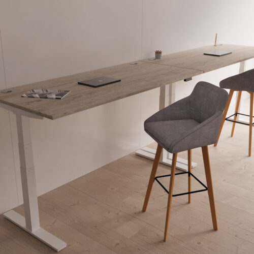 Two fabric poseur stools in grey fabric and wooden legs, and 2 height adjustable desks