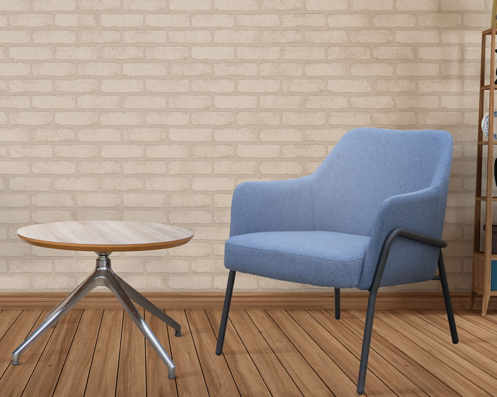 Fabric waiting room chair in blue and a small round coffee table