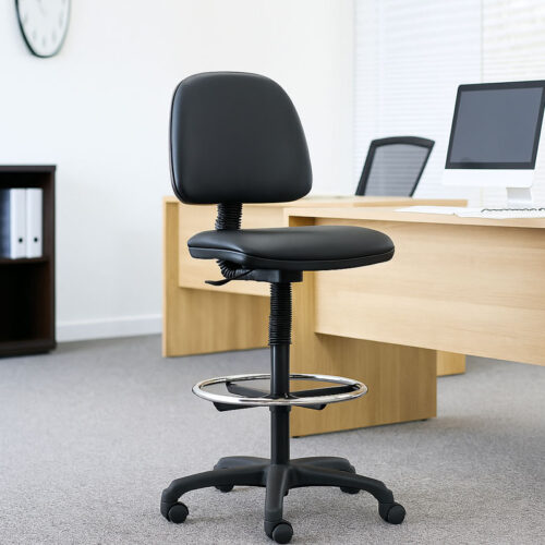 Faux leather draughtsman chair in black, at a desk