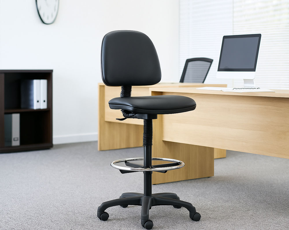 Faux leather draughtsman chair in black, at a desk
