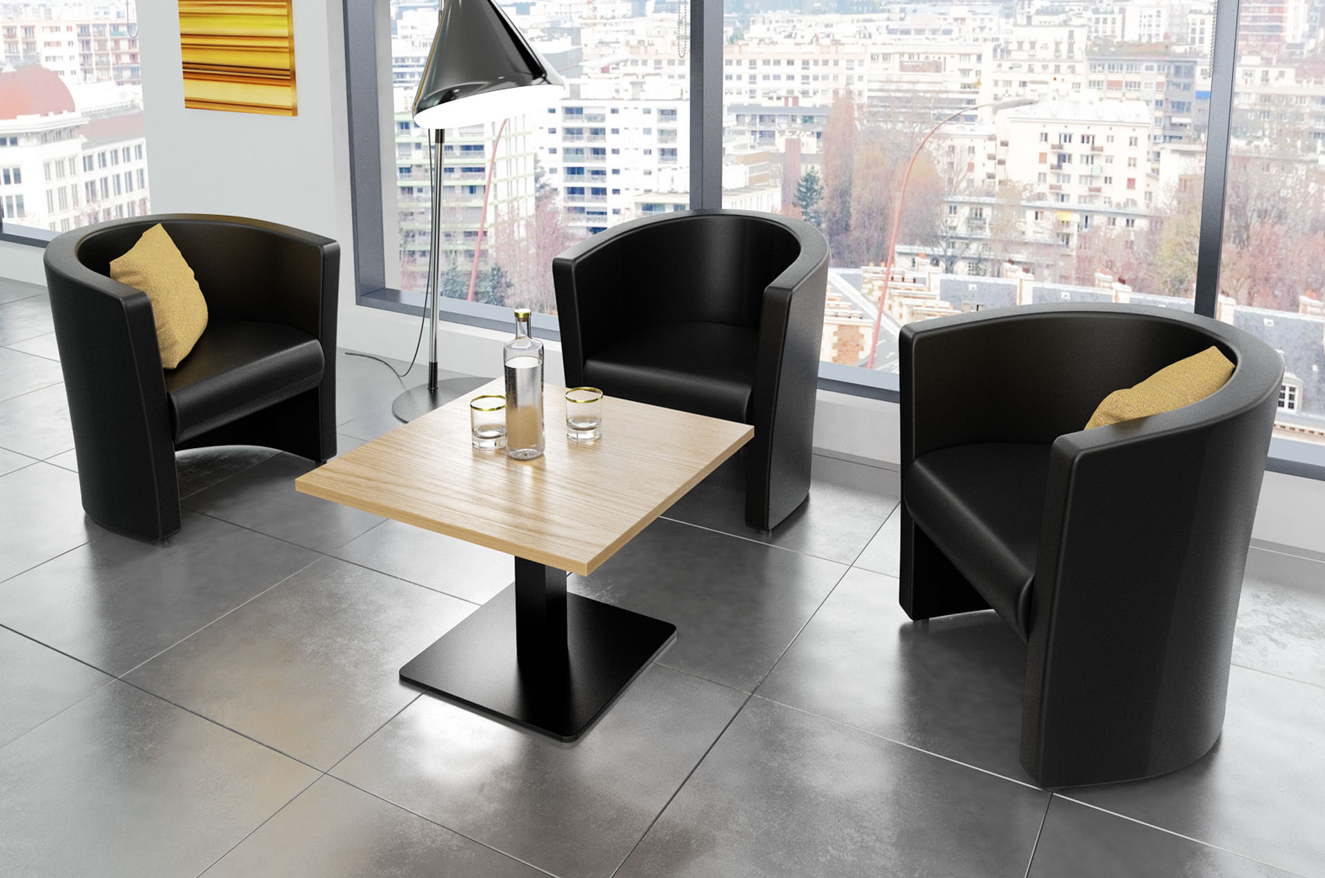 Three leather waiting room tub chairs in black and a small square coffee table