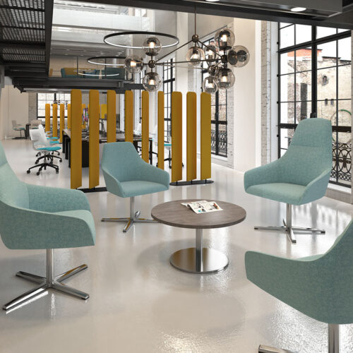 Four lounge chairs with 4 Star Steel Bases in green fabric, and a small circular coffee table