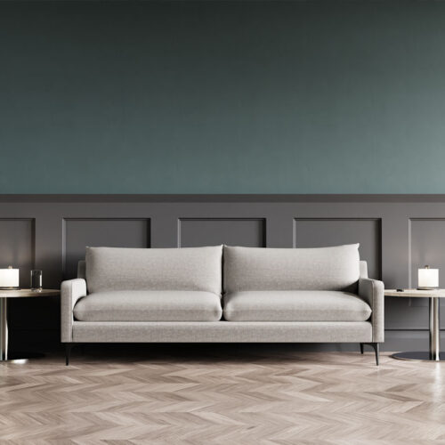Low back reception sofa in grey fabric and two round coffee tables
