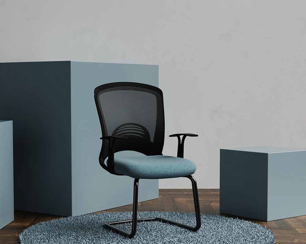 Mesh back meeting chair with black frame and green seat