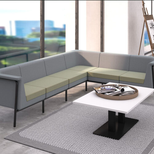 Metal framed modular reception chairs in grey and green fabric, and a square white coffee table