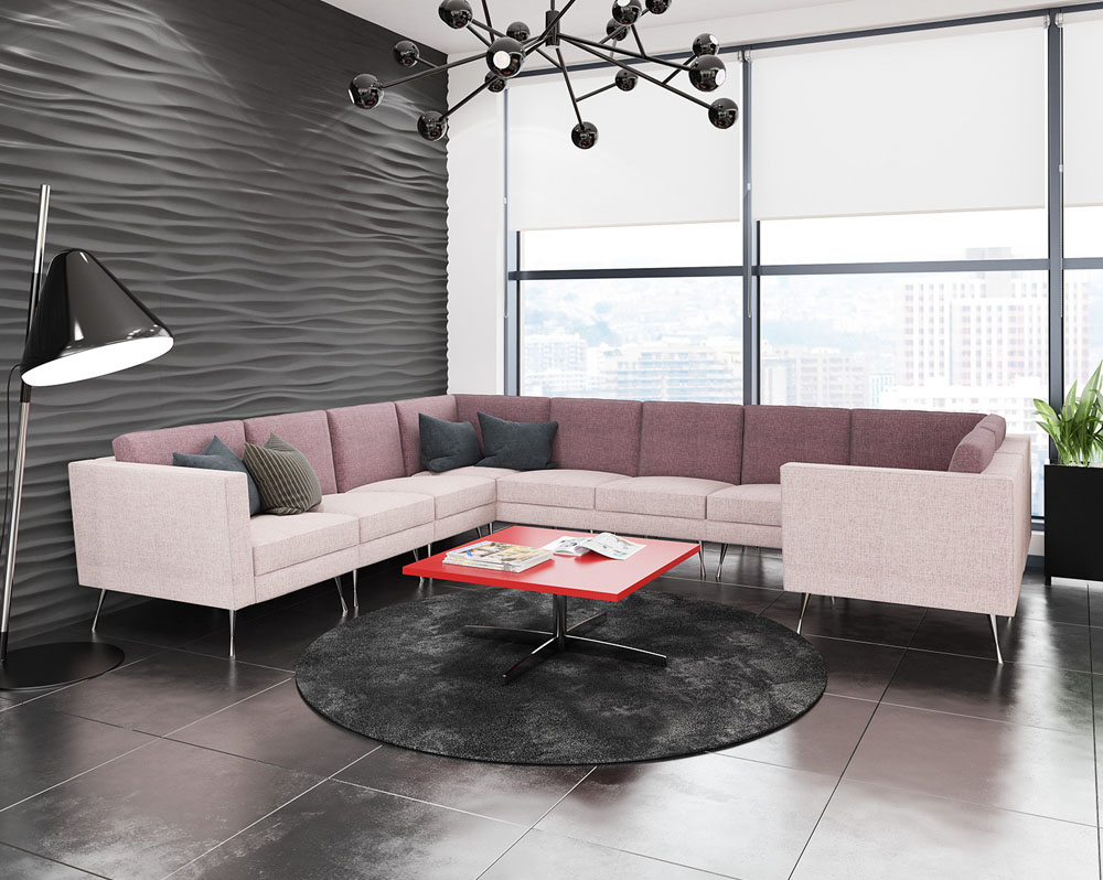 Modular reception chairs in pale pink fabric and grey cushions, plus a square coffee table with red top