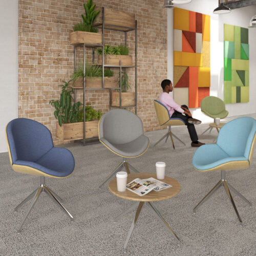 Social spaces breakout chairs in assorted colours and a small circular coffee table