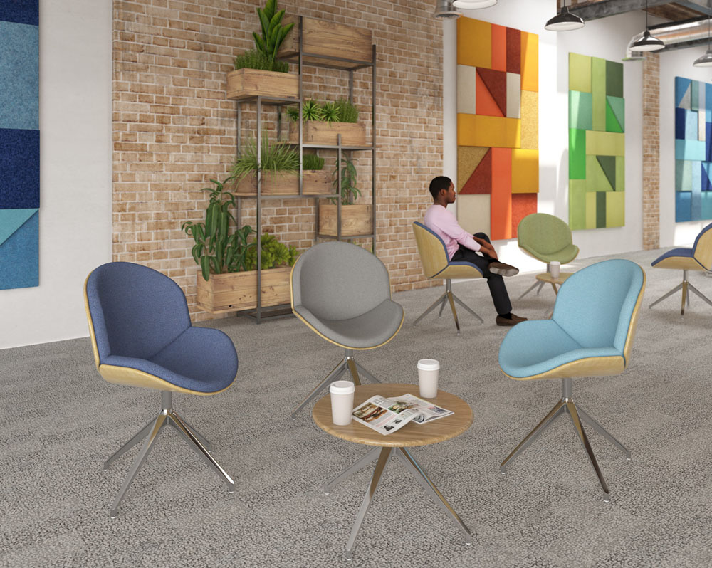 Social spaces breakout chairs in assorted colours and a small circular coffee table
