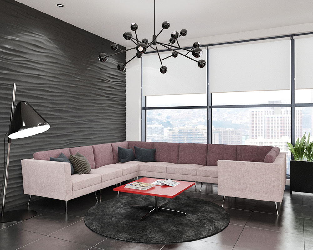 Modular seating in pale pink fabric and a square coffee table, in a social space environment