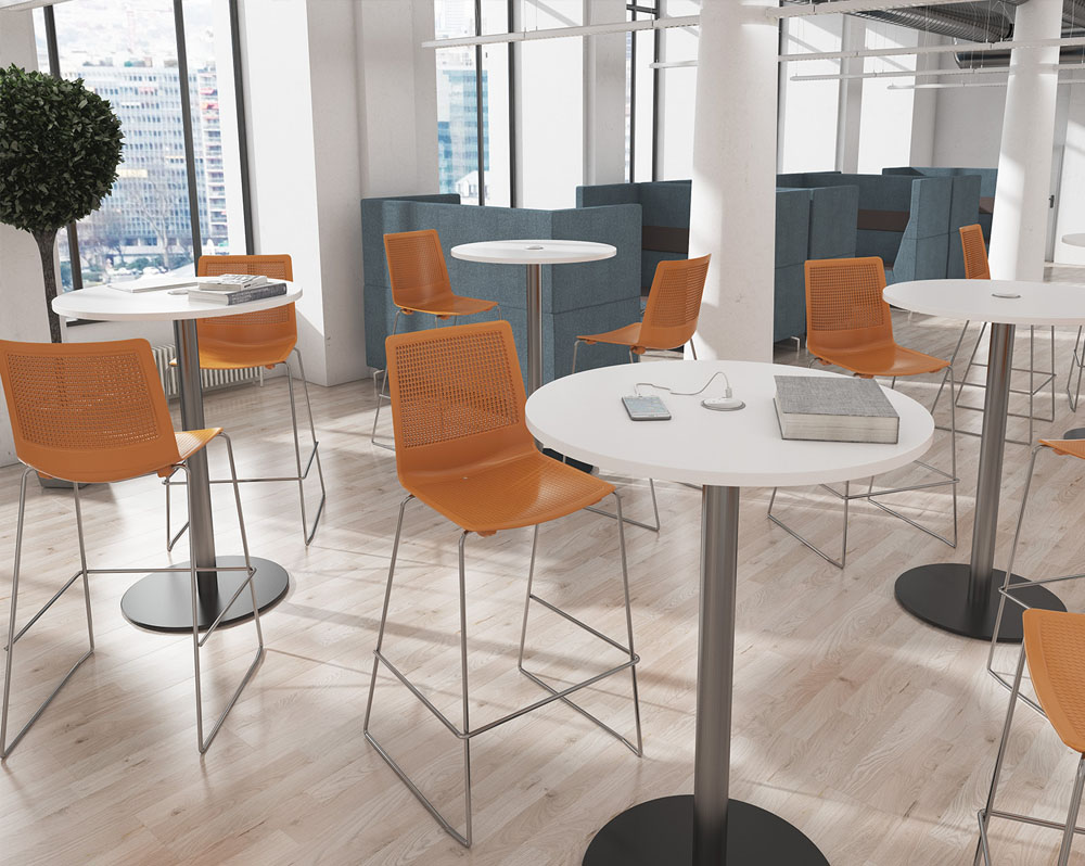 Social spaces poseur stools in orange around a circular poseur table
