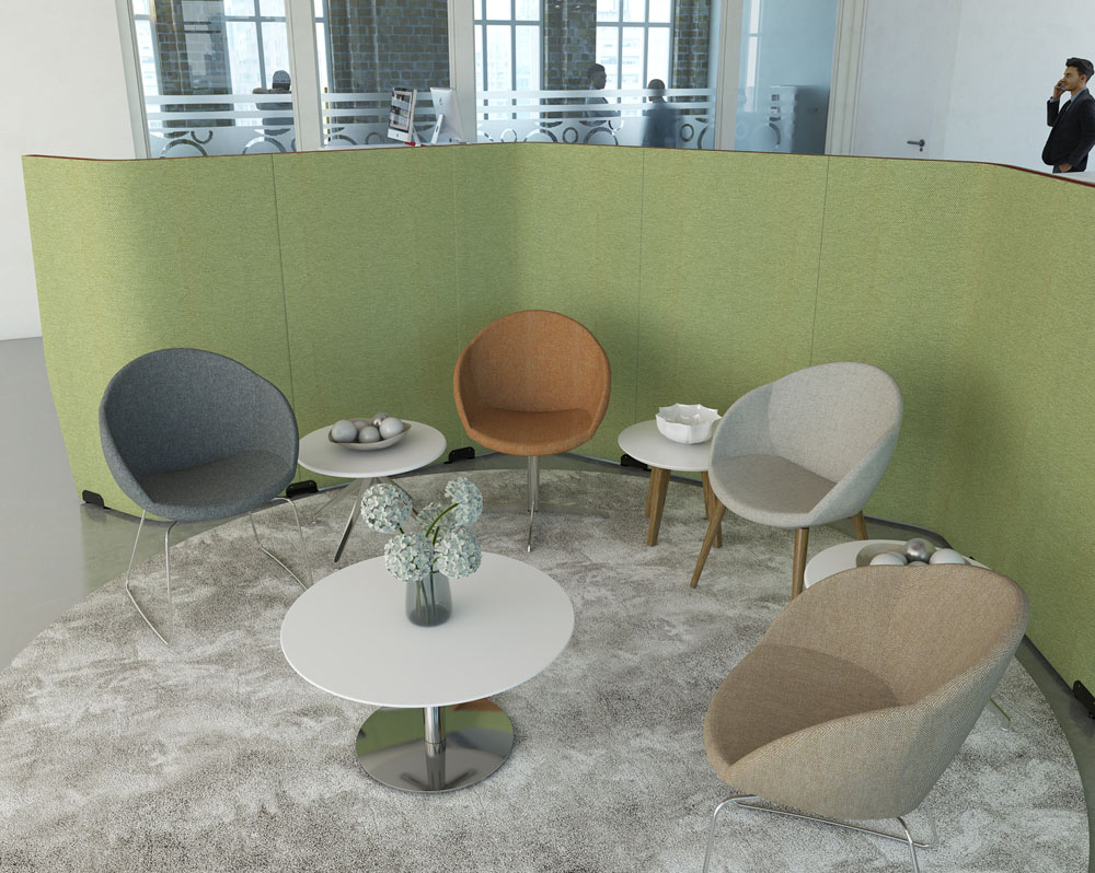 a selection of soft seating breakout chairs and a round coffee table.