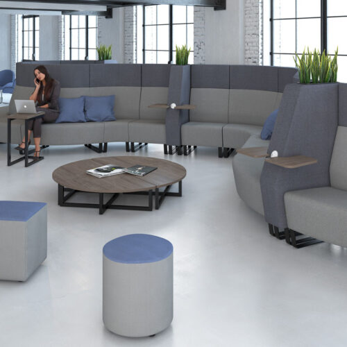Configurable soft seating in a modern office reception area