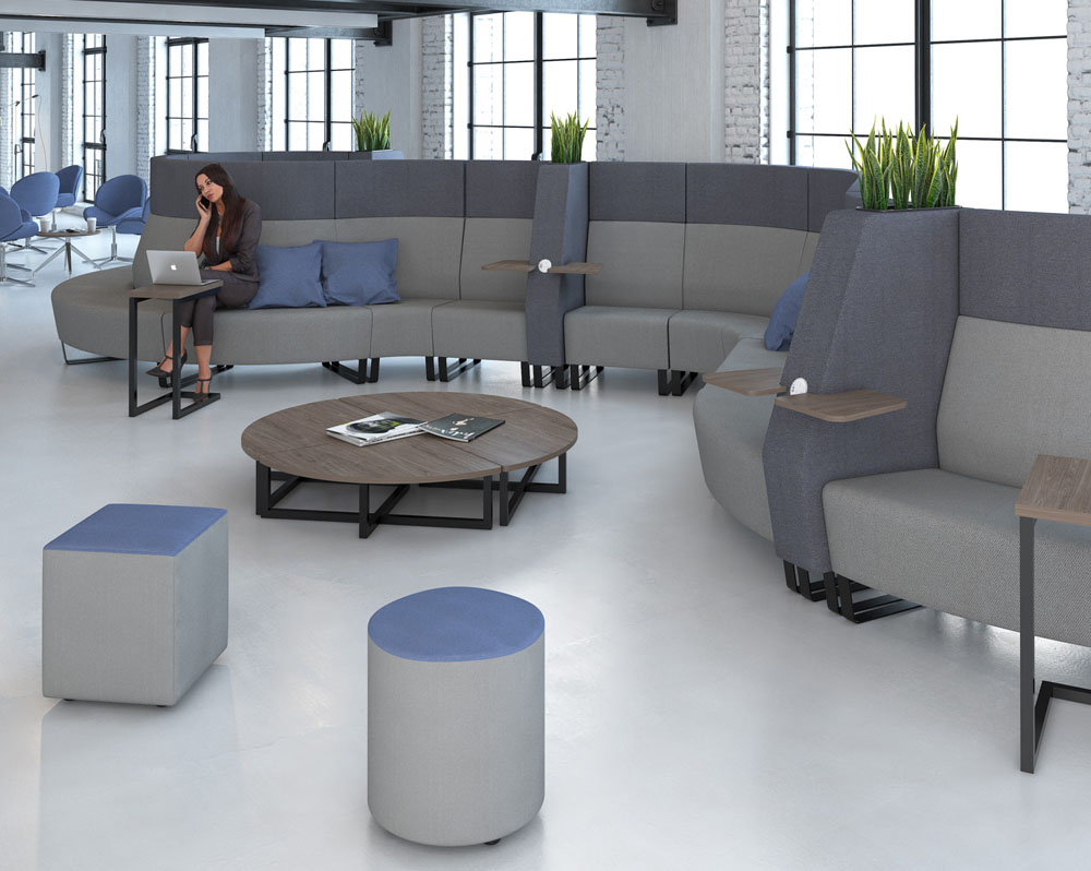 Configurable soft seating in a modern office reception area
