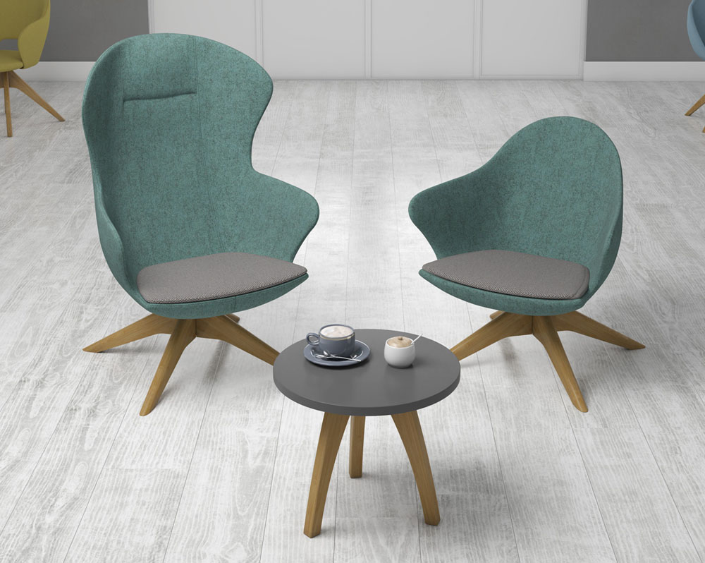 Soft seating lounge chairs and a small round coffee table