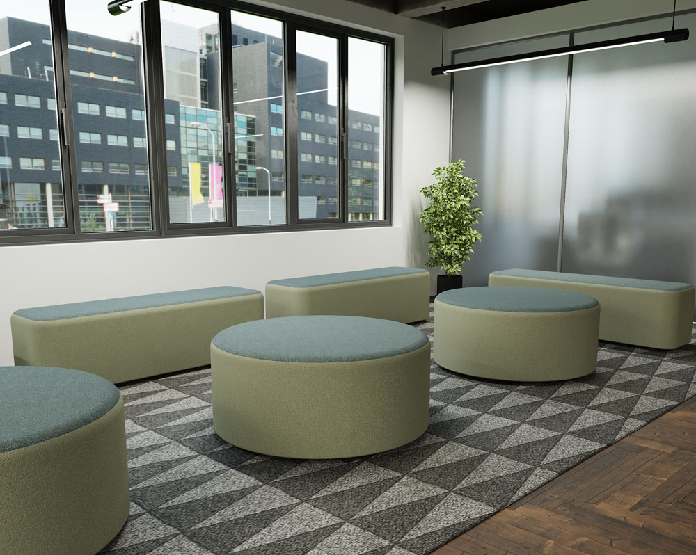 Reception soft seating in two tone green fabric, in a modern reception area
