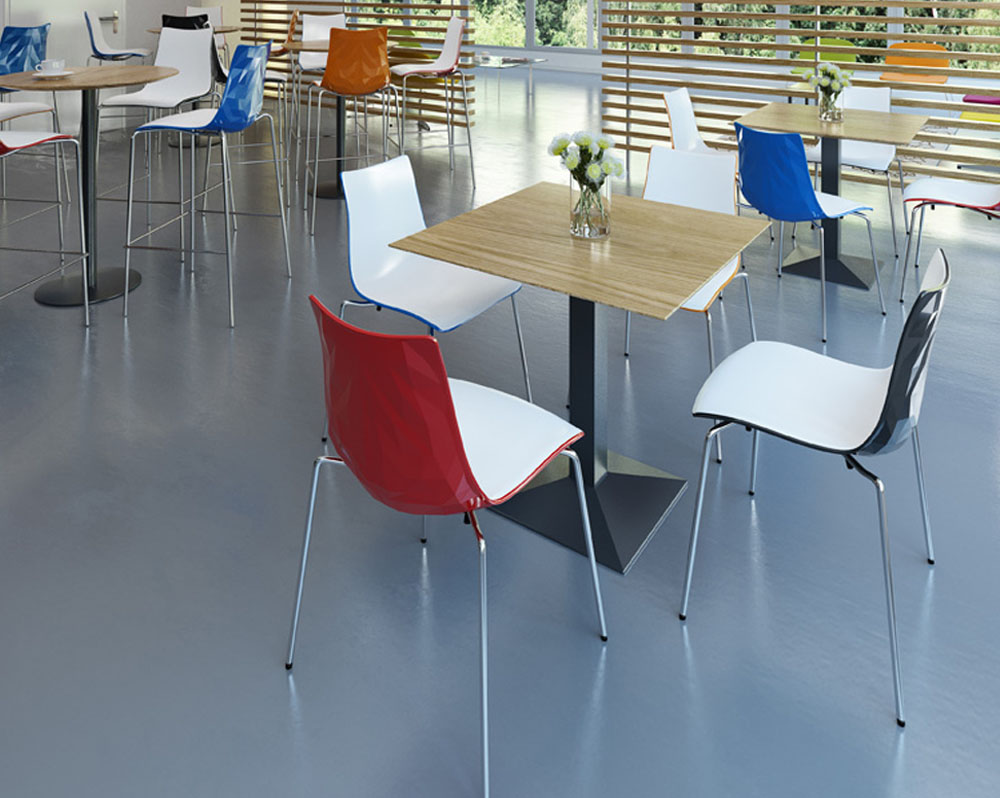 Stacking canteen chairs around a square canteen table