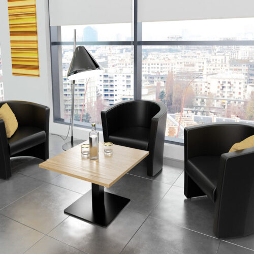 Three tub chairs in black around a square coffee table