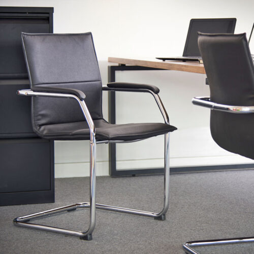 Stacking visitors chairs in black, with chrome frame
