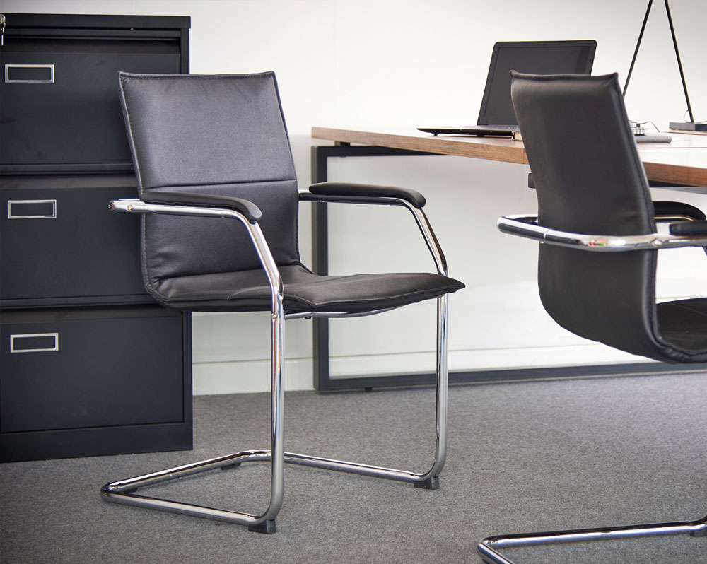 Stacking visitors chairs in black, with chrome frame