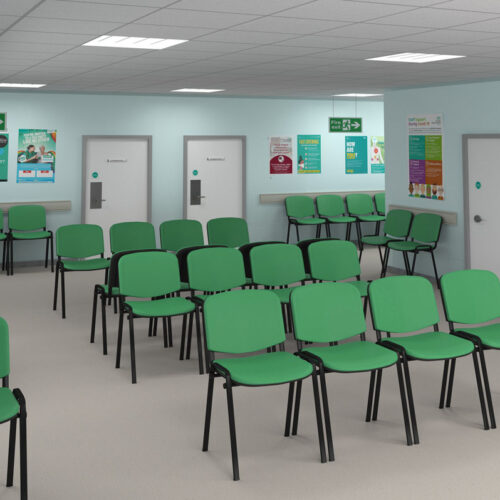 Waiting room chairs in green fabric and with a black frame, in a NHS hospital waiting room