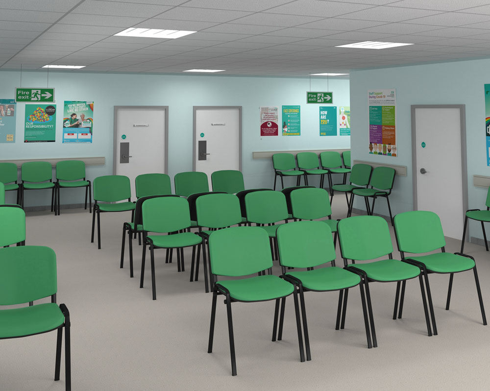 Waiting room chairs in green fabric and with a black frame, in a NHS hospital waiting room