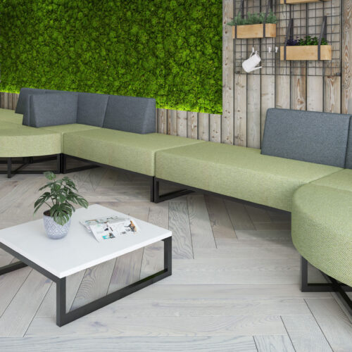 Configurable seating in two tone green and grey fabric in a large waiting room