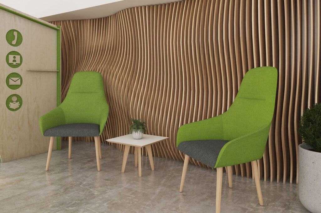 Waiting room lounge chairs in green and grey fabric, with wooden legs. In a modern reception area.