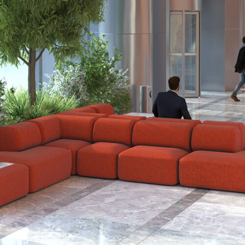 Modular seating in red fabric. In a large waiting room