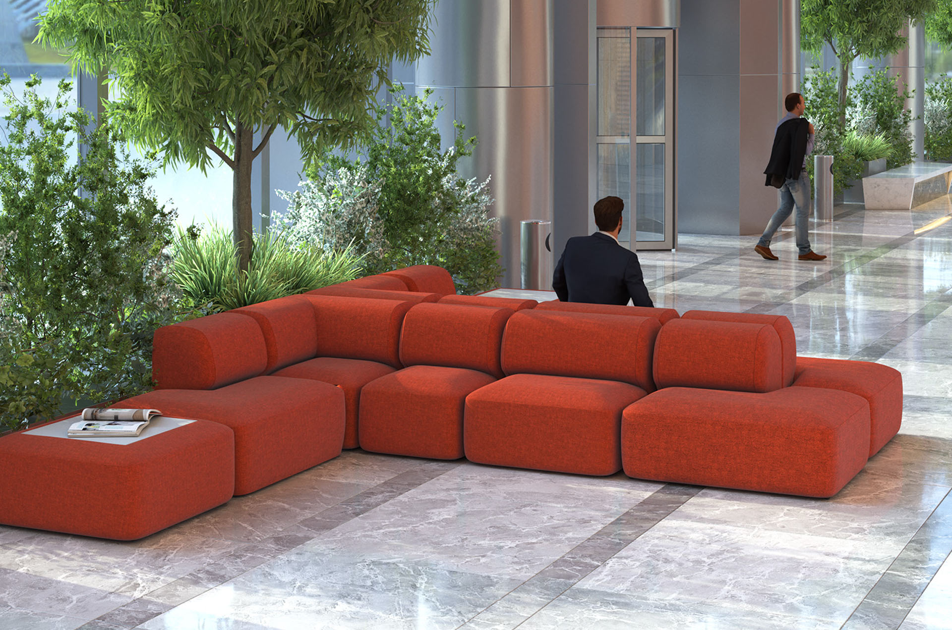 Modular seating in red fabric. In a large waiting room
