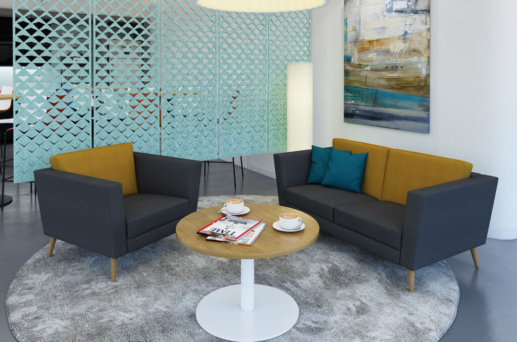 Waiting room sofas and armchairs in grey and yellow fabric and a circular coffee table