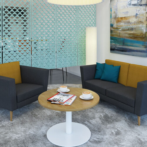 Waiting room sofas and armchairs in grey and yellow fabric and a circular coffee table