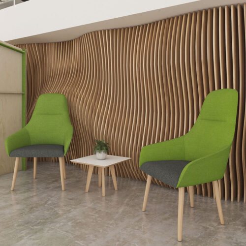 Two green fabric reception chairs with wooden feet