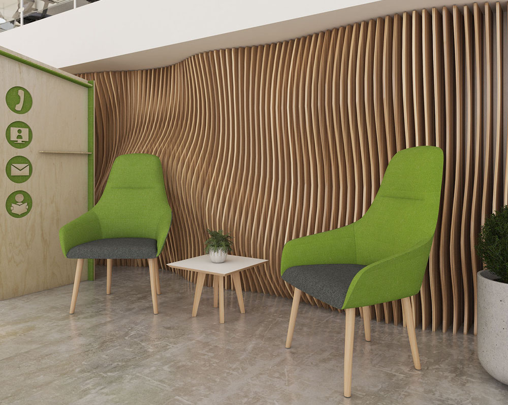 Two green fabric reception chairs with wooden feet