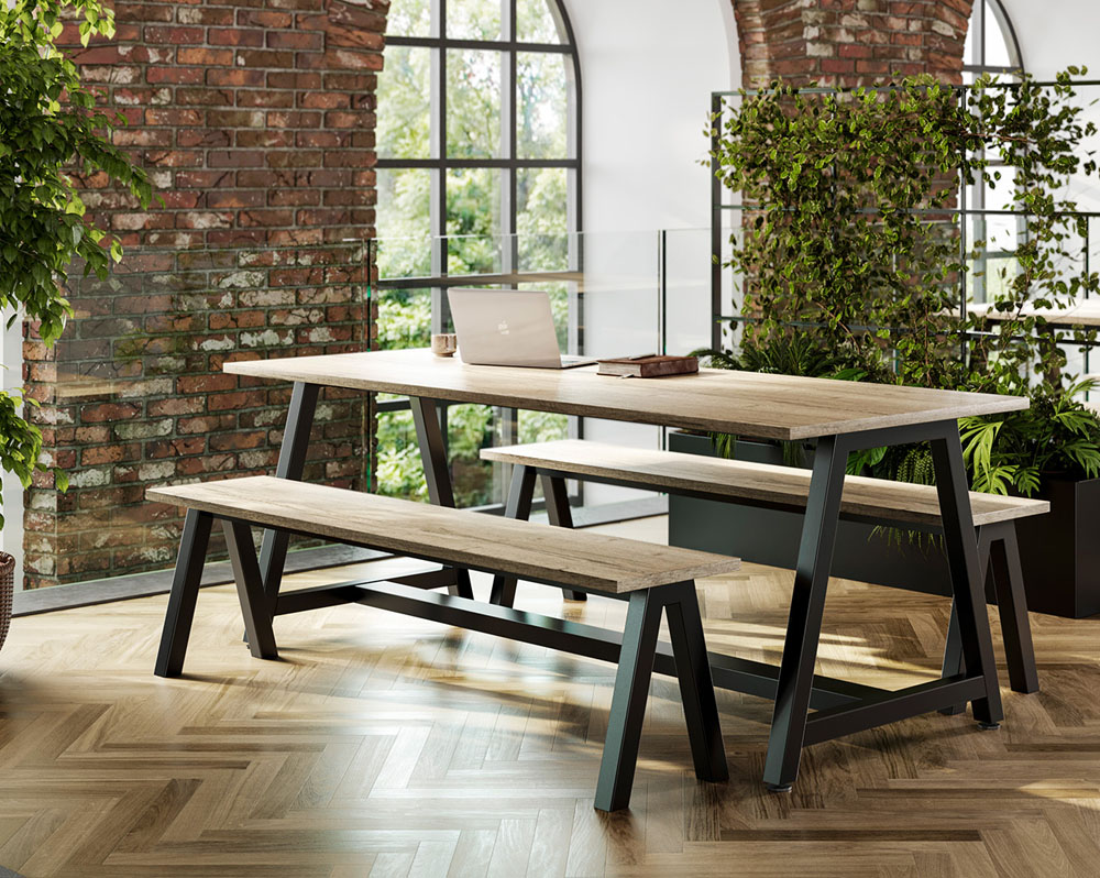 A-Frame leg table and bench seating in an open plan office