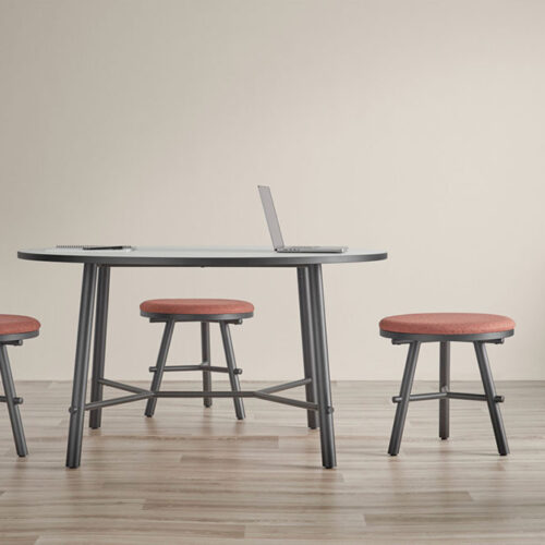 Aria table and 3 Aria stools, in a modern office.