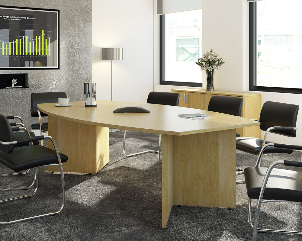 Boardroom table, with arrowhead legs and cantilever meeting chairs in a boardroom