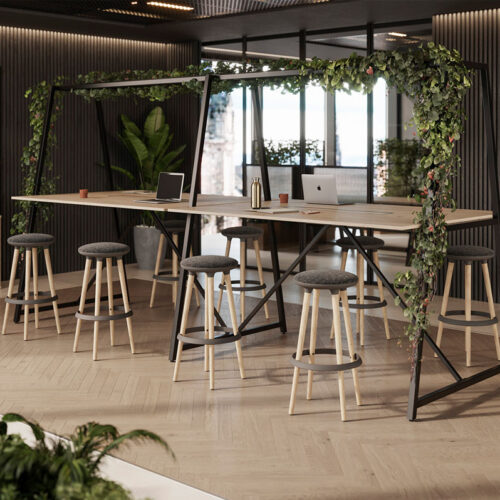 A beautiful Canopy table with artificial foliage and poseur height stools