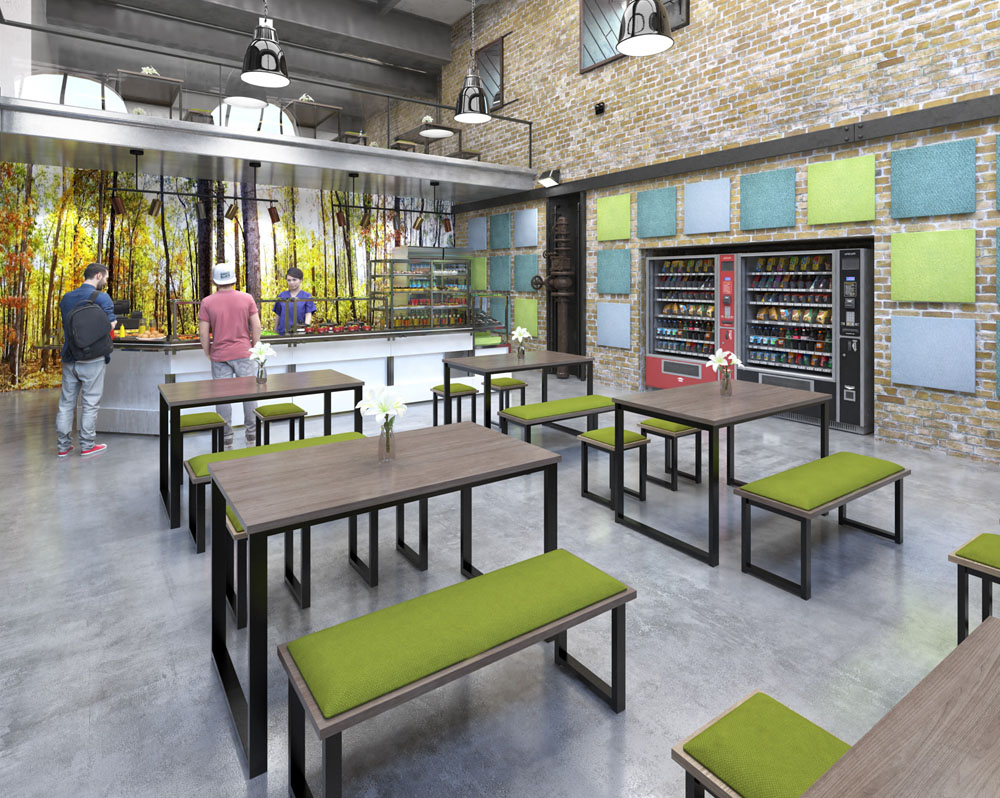 Metal framed tables and bench seating in a modern breakout area