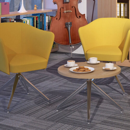 small round Otis coffee table, with beach top and chrome tripod base. And two yellow lounge chairs