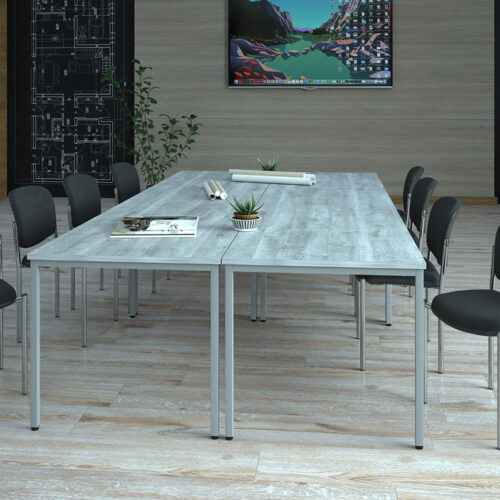 Four rectangular tables in a modern meeting room