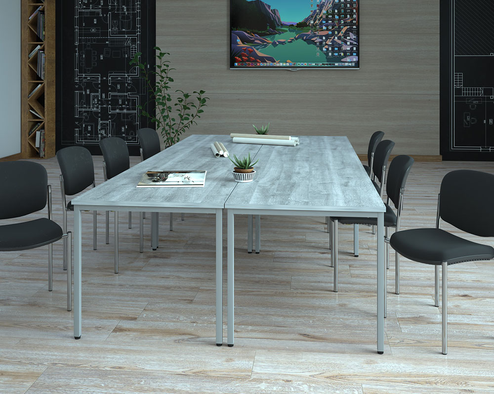 Four rectangular tables in a modern meeting room